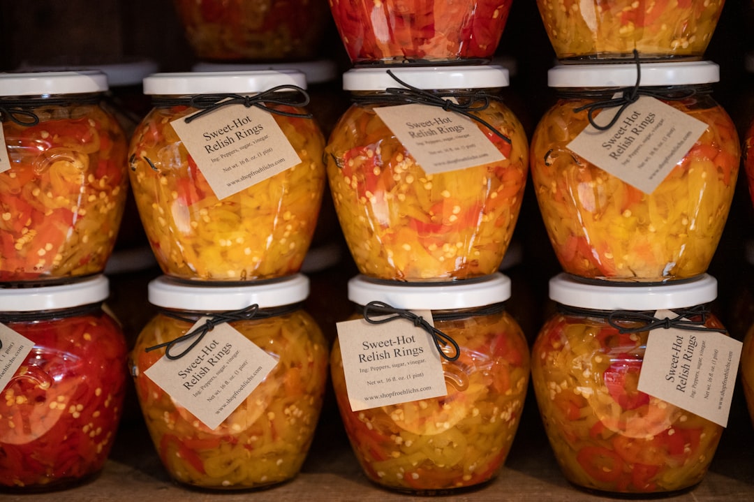 jars of pickled vegetables with labels on them