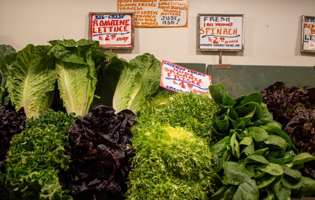 Fresh and colorful greens and lettuce for sale.